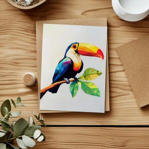 May include: A colourful geometric toucan perched on a branch with green leaves. The toucan's beak is yellow, orange, and red, and its body is blue, green, and yellow.