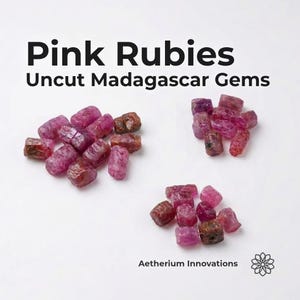 May include: The image displays several piles of uncut pink rubies against a white background. The text "Pink Rubies Uncut Madagascar Gems" is at the top. The gems vary in size and have a rough, natural appearance. The bottom of the image includes the text "Aetherium Innovations".