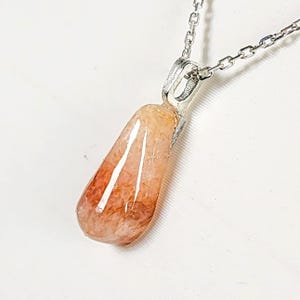 Hand-Carved Rose River Agate Pendant: Teardrop Sterling Silver Bail