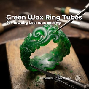 May include: A close-up of a green wax ring tube with an ornate floral design. The ring is being worked on with jewelry tools. Text on the image reads "Green Wax Ring Tubes For Jewelry Lost wax casting."