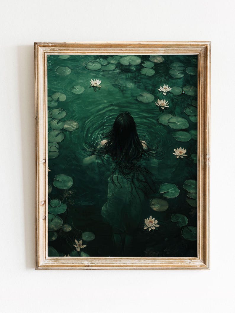 May include: A woman with long dark hair swims in a pond with lily pads and white flowers. The water is a deep green color.