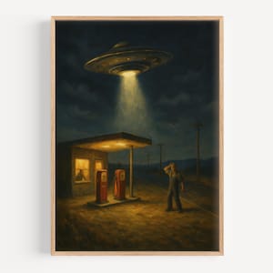 May include: A framed print depicts a vintage gas station scene under a dark, cloudy sky. A UFO hovers above, shining a bright light down on the station. A person stands nearby, looking up in surprise. The scene is painted in muted tones.