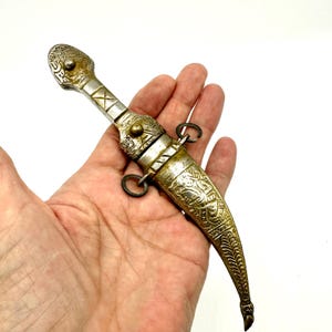 Vintage decorative dagger with etched sheath – ornate middle eastern style blade