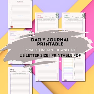 May include: Printable daily journal with 7 pages, including a to-do list, daily planner, end of day reflection, and notes sections. The journal is designed in a light pink and purple color scheme with floral accents. The text "DAILY JOURNAL PRINTABLE" is displayed in a large font on a gray background.