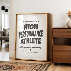 May include: A motivational poster with a white background and black text that reads "It's real sweat. I'm a HIGH PERFORMANCE ATHLETE. Athletes sweat. Sweat baby. Ki ki ki, ra, sweat sweat."