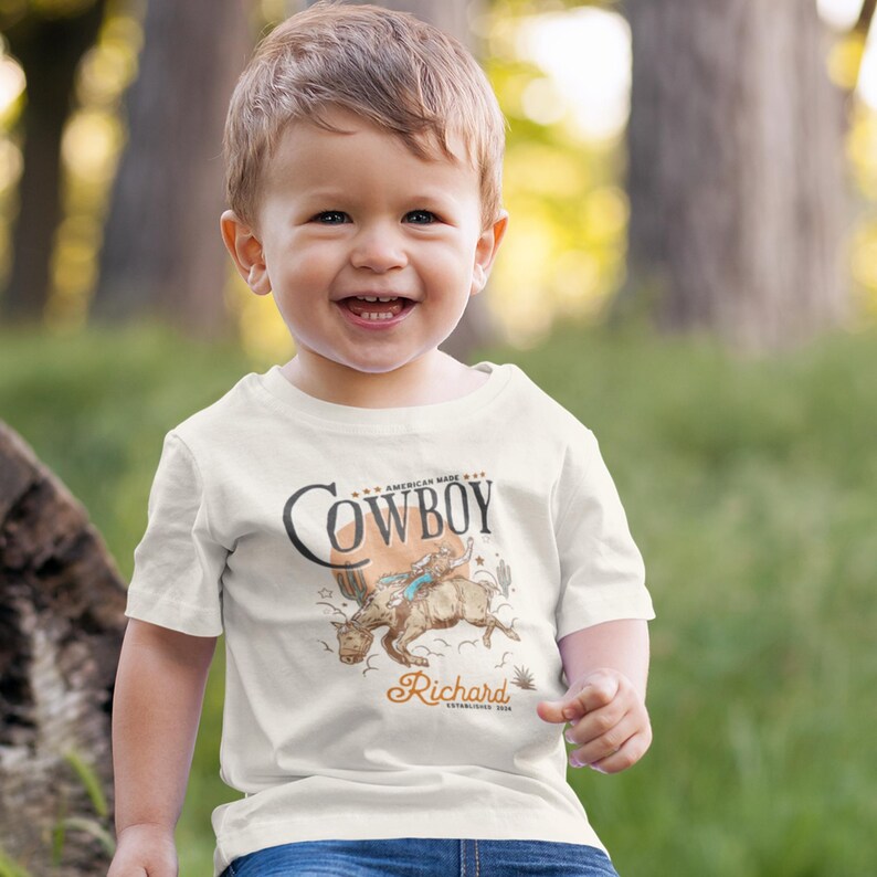 Personalized Cowboy Birthday Shirt – For Your Little Sheriff’s Big Day! 🎉

Yeehaw! Celebrate your little cowboy’s special day with this adorable personalized shirt. Perfect for wild west parties and unforgettable photos. 💛

Make their birthday special—grab yours now and let the adventure begin! 🐴✨ Cowboy Toddler Shirt! It's perfect for capturing memories together!