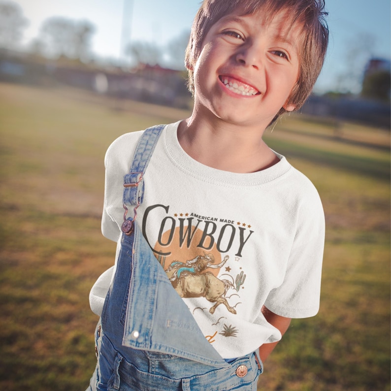 Personalized Cowboy Birthday Shirt – For Your Little Sheriff’s Big Day! 🎉

Yeehaw! Celebrate your little cowboy’s special day with this adorable personalized shirt. Perfect for wild west parties and unforgettable photos. 💛

Make their birthday special—grab yours now and let the adventure begin! 🐴✨ Cowboy Toddler Shirt! It's perfect for capturing memories together!
