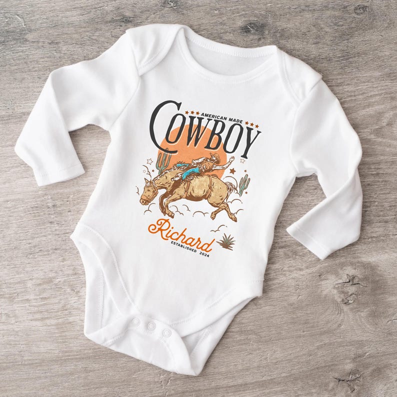 Personalized Cowboy Birthday Shirt – For Your Little Sheriff’s Big Day! 🎉 Yeehaw! Celebrate your little cowboy’s special day with this adorable personalized shirt. Perfect for wild west parties and unforgettable photos. 💛 Make their birthday special—grab yours now and let the adventure begin! 🐴✨ Cowboy Toddler Shirt! It's perfect for capturing memories together!