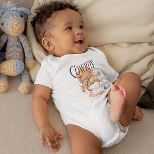 Personalized Cowboy Birthday Shirt – For Your Little Sheriff’s Big Day! 🎉

Yeehaw! Celebrate your little cowboy’s special day with this adorable personalized shirt. Perfect for wild west parties and unforgettable photos. 💛

Make their birthday special—grab yours now and let the adventure begin! 🐴✨ Cowboy Toddler Shirt! It's perfect for capturing memories together!