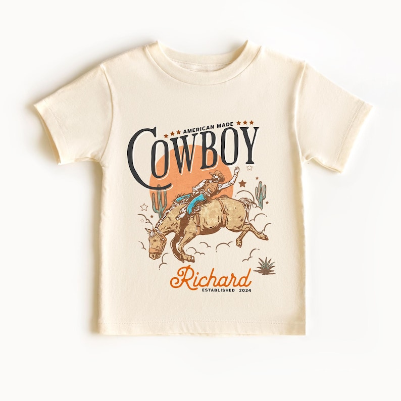 Personalized Cowboy Birthday Shirt – For Your Little Sheriff’s Big Day! 🎉

Yeehaw! Celebrate your little cowboy’s special day with this adorable personalized shirt. Perfect for wild west parties and unforgettable photos. 💛

Make their birthday special—grab yours now and let the adventure begin! 🐴✨ Cowboy Toddler Shirt! It's perfect for capturing memories together!