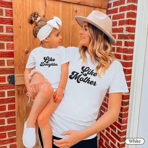 Like Mother, Like Daughter – A bond like no other! Celebrate your special connection with this matching Mom & Me shirt, perfect for birthdays, Mother’s Day, or just because—a timeless keepsake to cherish those unforgettable moments together.  Get yours today and twin in love!