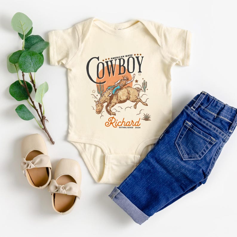Personalized Cowboy Birthday Shirt – For Your Little Sheriff’s Big Day! 🎉

Yeehaw! Celebrate your little cowboy’s special day with this adorable personalized shirt. Perfect for wild west parties and unforgettable photos. 💛

Make their birthday special—grab yours now and let the adventure begin! 🐴✨ Cowboy Toddler Shirt! It's perfect for capturing memories together!