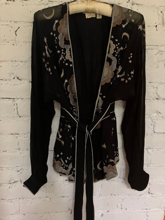 Black embroidered evening blouse. Star and moon mo
