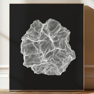 May include: A black and white abstract art print featuring a white, geometric, 3D design on a black background. The design resembles a crumpled piece of paper.