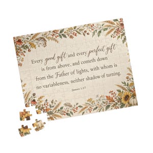 Puede incluir: Un rompecabezas rectangular con fondo color crema y un borde de ilustraciones botánicas otoñales que incluyen girasoles, trigo y bayas. El texto dice: Every good gift and every perfect gift is from above, and cometh down from the Father of lights, with whom is no variableness, neither shadow of turning. James 1:17.