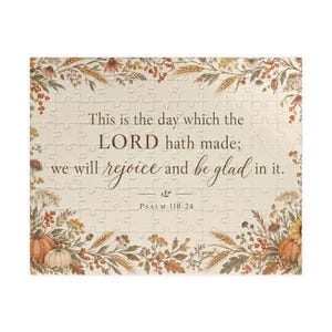 Puede incluir: Un rompecabezas rectangular con fondo crema y un borde de trigo, bayas y calabazas de otoño. El texto dice: This is the day which the LORD hath made; we will rejoice and be glad in it. Psalm 118:24.