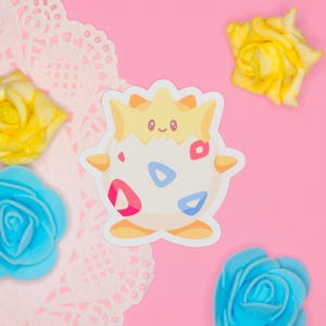 A die cut vinyl sticker inspired by a fairy type Pokemon.