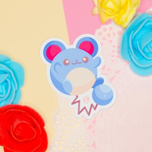 A kawaii vinyl sticker inspired by an anime video game.