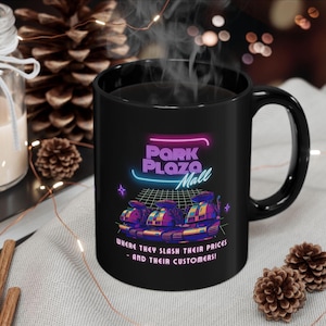 May include: Black ceramic mug featuring the text "Park Plaza Mall" in neon colors, with a retro bumper car graphic. The mug also includes the phrase "Where they slash their prices - and their customers!"