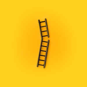 May include: A black plastic ladder is broken in half and is laying on a yellow background.