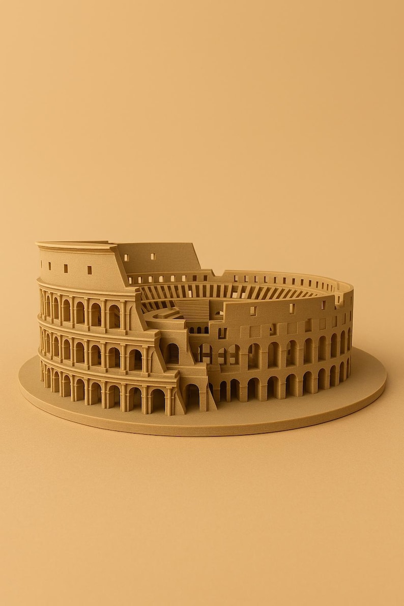 May include: A detailed model of the Colosseum in Rome, Italy. The miniature structure is rendered in a tan color, showcasing the iconic amphitheater's arches, levels, and overall design. It sits on a circular base, with a neutral background.
