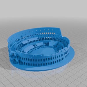 May include: A light blue 3D model of the Colosseum, a Roman amphitheater. The model is a detailed representation of the historic structure, showcasing its architectural features. The model is made of a solid material and is set against a neutral background.