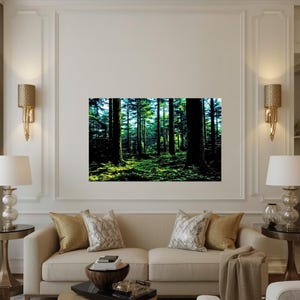 May include: A rectangular wall art print featuring a dense forest scene with tall dark tree trunks and vibrant green mossy ground. The image displays deep shadows and bright light filtering through the canopy, creating a high contrast woodland view.