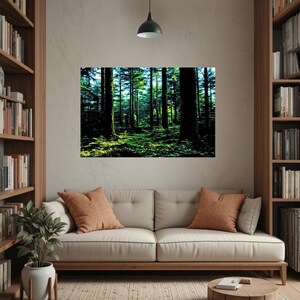 May include: A rectangular wall art print featuring a dense forest scene with tall dark tree trunks and vibrant green foliage illuminated by patches of sunlight filtering through the canopy, creating a high contrast between light and shadow.