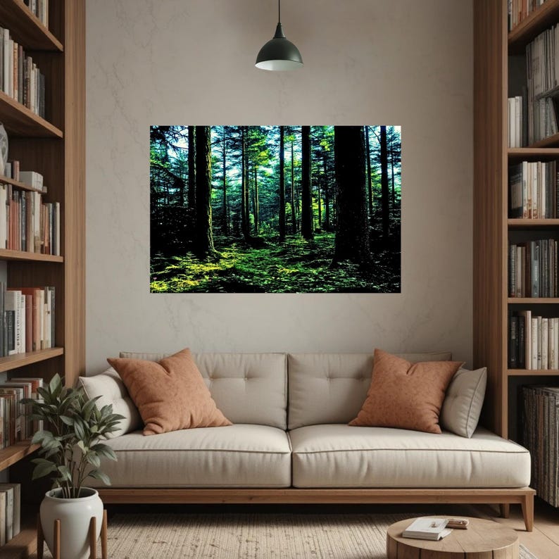 May include: A rectangular wall art print featuring a dense forest scene with tall dark tree trunks and vibrant green foliage illuminated by patches of sunlight filtering through the canopy, creating a high contrast between light and shadow.