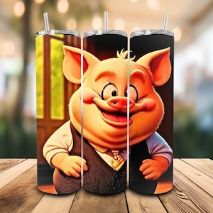 May include: Three stainless steel tumblers with a cartoon pig design. The pig is wearing a vest and tie, with a big smile. Each tumbler has a clear lid and a straw. The background is blurred, with a wooden table in the foreground.