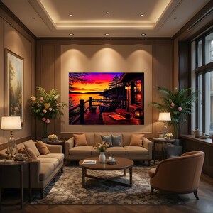 May include: A rectangular wall art print depicting a sunset over a lake with a wooden deck, a chair, and a lantern, displayed in a living room with beige sofas, a round coffee table, two lamps, and potted plants on a patterned area rug.