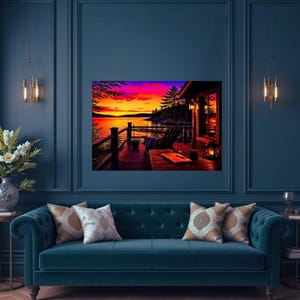 May include: A rectangular wall art print depicting a vibrant sunset over a lake, viewed from a wooden deck with a chair, a table, and a lantern. The sky is filled with bright orange, pink, and purple hues, reflecting on the water surface.