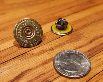 4     12 guage  Shotgun Shell Pins  - Vest pins - Hat pins - Lapel Pins - Tie Tack. Perfect for any one that enjoys the outdoors.