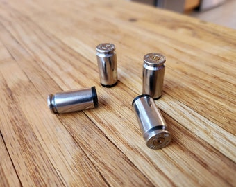 40 Caliber Valve Stem Caps - Made from once fired 40 s&w cases - Perfect for your car, truck, bicycle or atv.