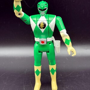 May include: A rustic wooden sign with the text "Welcome to our home" in white lettering. The sign features a distressed finish and a simple, inviting design, perfect for a front porch or entryway.