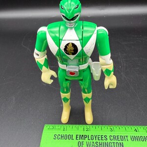 May include: A set of three ceramic mugs with a speckled, matte finish. The mugs are in shades of cream, light gray, and dark gray. Each mug has a simple, minimalist design, perfect for coffee or tea.