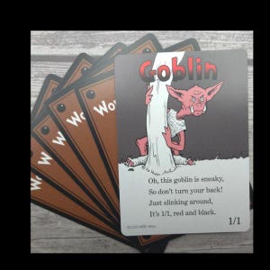 Carte token Goblin stravaganti (rosse/nere) per MTG illustrate da MRB Alters, foil o non foil, stampate su cartoncino di qualità premium