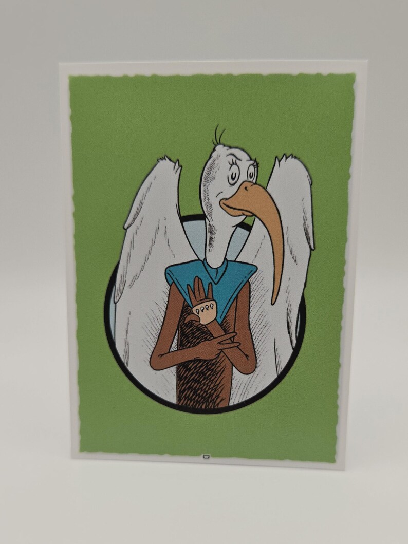 May include: A cartoon illustration of a white bird with a long orange beak, wearing a blue shirt and standing with its wings spread out. The bird is in a circle with a green background.