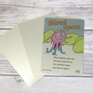 Puede incluir: Una tarjeta con el texto "Eldrazi Spawn" y una ilustración de una criatura rosa con tentáculos azules. La tarjeta también incluye el texto "When Eldrazi come out, You know that it's on!" y "Sac this 0/1 spawn."