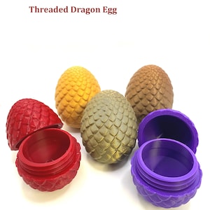 May include: Five dragon egg-shaped containers, each with a different color and a threaded lid. The colors are red, gold, purple, brown, and yellow. The containers are made of plastic and have a textured surface.