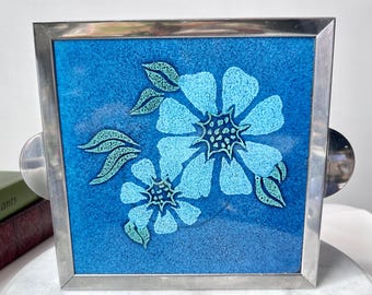 Salvamanteles de azulejos con flores azules