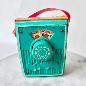 Vintage Fisher Price Pocket Radio - Etsy