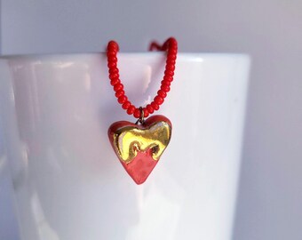 dripping heart, glass pearl necklace, 22k gold, red/ white