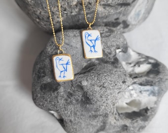 Bird motif, porcelain necklace, 22k gold, white/ blue, 2 variants