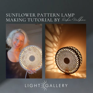 Può includere: Una lampada in ceramica bianca con un motivo a girasole, che proietta un bagliore caldo sul muro. La lampada è accesa e il motivo crea un bellissimo effetto ombra. Il testo "SUNFLOWER PATTERN LAMP MAKING TUTORIAL BY Reka Valkai" è in alto nell'immagine. Il testo "LIGHT GALLERY" è in basso nell'immagine.
