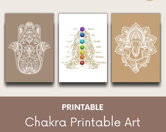 May include: Printable art set featuring three designs: a hamsa hand, a chakra symbol with a woman meditating, and a Ganesha mandala. Each design is in white on a brown background.