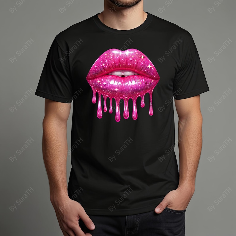 May include: Black t-shirt featuring a vibrant, glittery pink lips graphic. The lips have a dripping effect, with sparkling highlights. The design includes white teeth and is centered on the shirt.