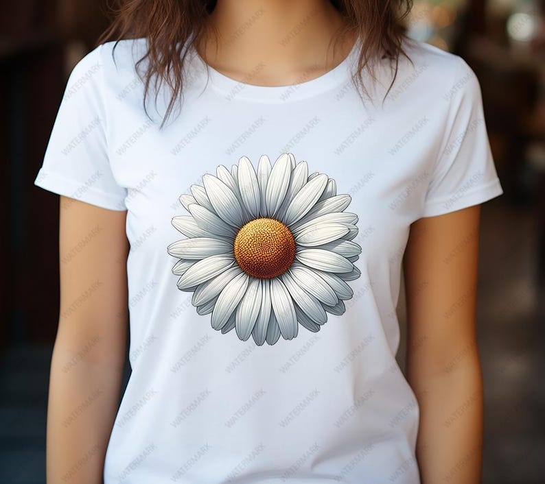 Op de afbeelding: Wit T-shirt met een grote, witte madeliefjesprint. De madeliefjes hebben een gele kern en witte bloemblaadjes.