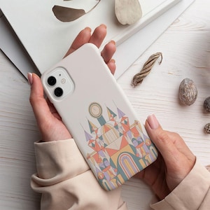 May include: A set of three ceramic mugs with a speckled, matte finish. The mugs are in shades of cream, light gray, and dark gray. Each mug has a simple, minimalist design, perfect for coffee or tea.