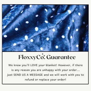 a blue blanket with white dots on it